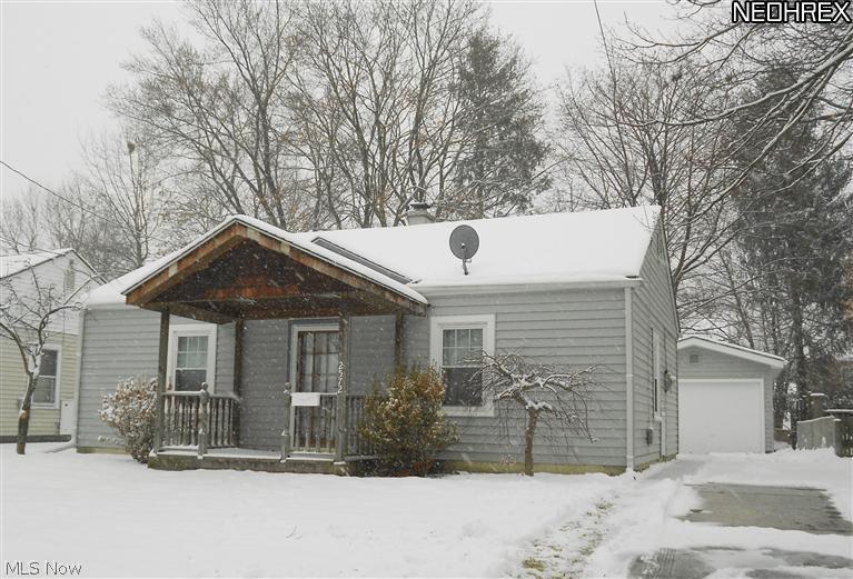 Move in ready! Cute as can be! Adorable two bedroom ranch offers spacious rooms, delightful eat-in oak kitchen, remodeled full bath, one car garage with door opener, and beautiful fenced in backyard. Updates include siding and insulation in 2013, replacement windows in 2010 and roof in 2003. Great front porch for enjoying the seasons. Ellet school system.