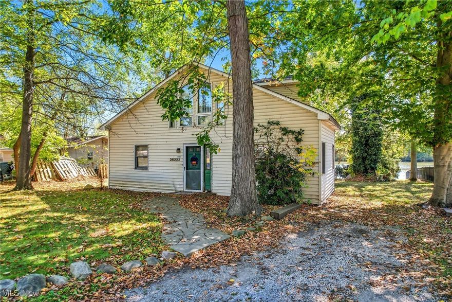 Waterfront with a beautiful view and close to where the road ends, so traffic is very limited!  If you have imagined a lake house, this house is ready for it's next chapter.  Are you ready to write it?  Bring your vision. The gas heat cottage with gas appliances currently offers two bedrooms, a large full bath, an eat in kitchen, an inviting entryway, a cozy living room with fireplace, and a laundry/utility room all on the first floor.  Upstairs is a nice loft for a third bedroom and unfinished space with great lake views that could be whatever you'd vision it to be.  With your own dock and a lovely yard, you'll find yourself outside whenever weather permits.  In addition, a large two car garage has extra room for tinkering outside on a rainy day.  This is your chance to build sweat equity and design your dream lake home from the ground up.  This sells as-is with a brand new furnace motor just installed.  Seller will not be making repairs or upgrades, but they are motivated!  Schedule your viewing appointment soon!