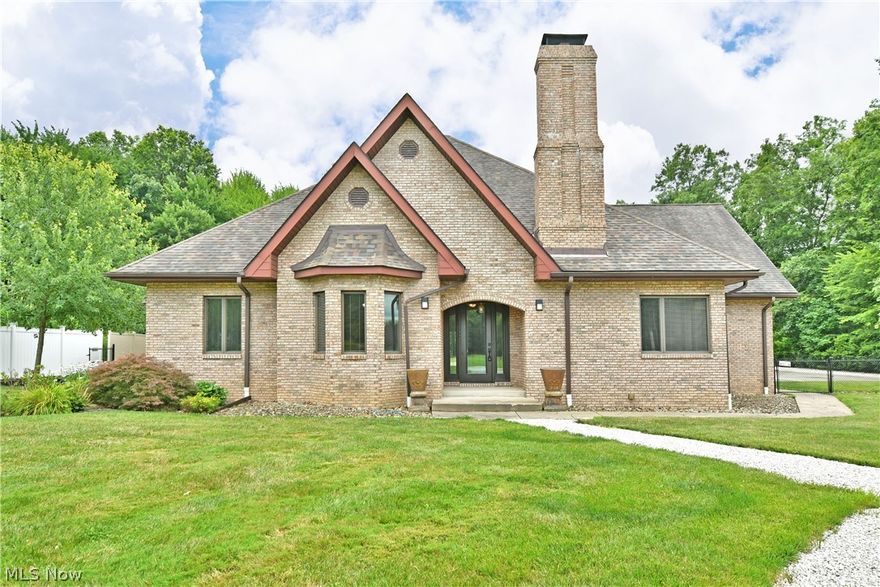 Create your own kingdom with this elaborate Warren estate, engaging your senses with a visual masterclass that spans this incredible three-bedroom brick home! Including over five acres of land and a massive outbuilding for all your toys, this must-see residence everything on your wish list and then some.  The outstretched driveway includes a scenic turnaround before entering the security fence gated main parking area to include the attached three car garage and expansive rear patio with pergola topped spa and covered entertainment space. Inside, a decorative entry door swings open to reveal a spacious living room with plush carpets and a brick lined fireplace that creates a stunning focal point. Formal dining awaits steps away through sculpted archways. The central kitchen wows with its monstrous footprint, encompassing additional dining, bar provisions and a striking, stone topped island that offsets the remaining countertops and glass tiled backsplash. Around the corner, a half bath bestows lovely tile work as the adjacent laundry room is home to the shower facilities, dressed in matching appearances. The main hallway ties the trio of inviting bedrooms as it transcends a joining full bath. The oversized master suite completes the package with an opulent full bath, fit for royalty as it gestures gold trim and jacuzzi style tub unlike any other. Call today to see it person!