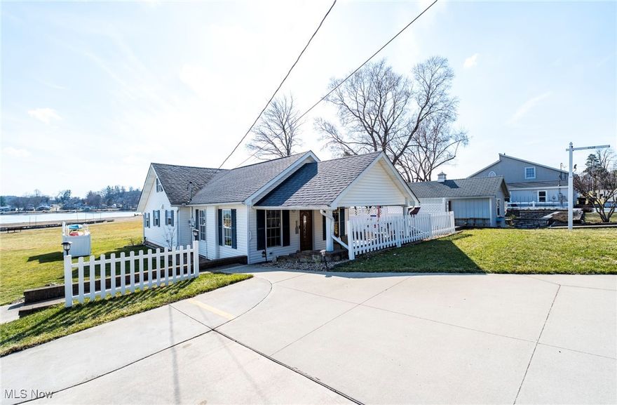 Beachfront Bungalow at Guilford Lake State Park just listed! Looking for the perfect lakeside retreat? This charming 2/3-bedroom, 1.5-bathroom cottage is just steps from the water at Guilford Lake State Park. With 1374 sq. ft. of living space, it’s the ideal getaway for those seeking tranquility and adventure all in one. Built in 1950 and completely remodeled in 2013, this home blends vintage charm with modern comforts. Gorgeous woodwork throughout adds warmth and character to every room. Enjoy the convenience of first-floor living, with the primary bedroom, bathrooms, and laundry all on the main level. The additional loft space easily accommodates two queen-sized beds, perfect for hosting guests. The spacious main bathroom features both a walk-in shower and a soaking tub, offering the ultimate in relaxation. Large bay windows in the dining room and primary bedroom provide stunning water views, letting you enjoy the beauty of the lake from inside the comfort of your home. Step outside to your covered porch, where the beach is just a few steps away. The outdoor entertaining area includes a beautiful concrete patio with nature stone accents, offering partial sun—perfect for enjoying the outdoors. Additionally there is a cozy propane fireplace in the living room for the perfect year-round setting, whether you're unwinding by the fire or hosting friends and family. A kayak rack with two kayaks is included, so you can start enjoying the lake as soon as you arrive. This is a rare opportunity to live lakeside and make lasting memories in time for spring. Don’t miss out on this breathtaking lakeside retreat!