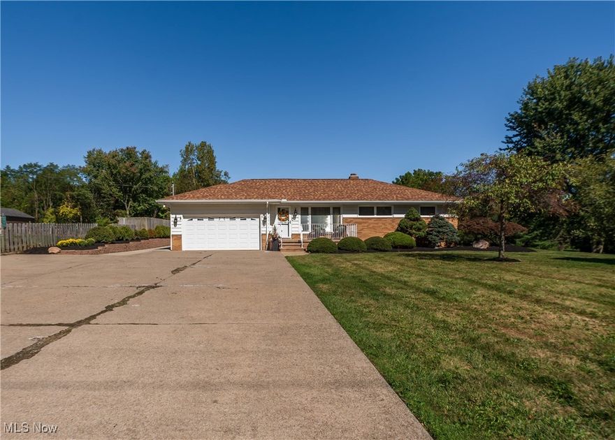 Welcome to 1435 Oakes Rd. in Broadview Heights ! This ranch style home sits on 1.4 acres that has all been professionally landscaped to give it the meticulous curb appeal as soon as you pull in. As a bonus, this home just had a brand new thirty year shingle roof put on this year! As you make your way inside, you will notice the gleaming hardwood floors on the main level that have just been resanded and stained to give them a brand new polished look. The kitchen opens up to the dining room and spacious open living room. Off the living room is a three seasons room that leads you into the very spacious covered back patio that is perfect for having get togethers or just relaxing after a long day. This home features three bedrooms on the main floor with one full bath and one half bath. This home offers the convenience of a first floor laundry. Down in the basement, all new LVT floors were just put in as well as all new lighting. There is also a bonus full bar in the basement as well as another full bath. This home is move in ready and is just needing you to make it yours. Call today for a private showing!
