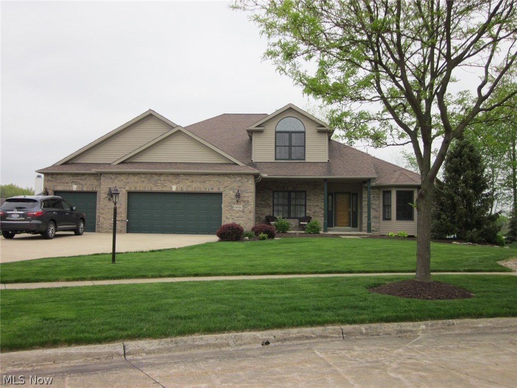 Better than new! Outside professionally landscaped w/sprinkler system front & back. Walk into hardwood foyer with office to the right & dining rm w/trayed ceiling on the left. Be greeted by the open floor plan w/great room (gas log fireplace and 2 stories) right into the kitchen w/stainless appliances, all staying. Plenty of eat-in space for a large table.There is granite everywhere even bathrooms. All carpet is brand new. Sun room makes a cozy space for reading or .....
First floor master is a huge plus & rare find. Master bath has jetted tub and double vanity. Also a walk in closet. Go down steps into almost totally finished basement w/full bath, work out room, rec room with wet bar, stereo system, and a room for showing movies or watching tv. another room for your workshop. Basement also contains 200 amp service panel, 75 gal full recovery hot water tank, 2 year old carrier furnace and A/c with 3 zoned areas. There is also a walk up into the extra large 3 car garage for full egress