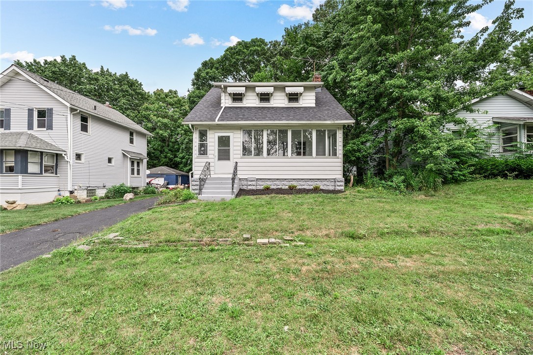 Move-in ready gem in the heart of Kenmore! This beautifully updated 3-bedroom, 1-bathroom home features a spacious layout and countless updates throughout. Enjoy brand new flooring, a fully renovated kitchen and bathroom, fresh paint, new hot water tank, furnace, A/C, garage door, and more—no detail has been overlooked. Relax on the large enclosed front porch or unwind in the enclosed rear patio, perfect for entertaining or year-round enjoyment. A spacious 2-car garage offers plenty of room for parking and storage. Whether you're a first-time buyer or looking to downsize, this home is truly turn-key. Just move in and enjoy!