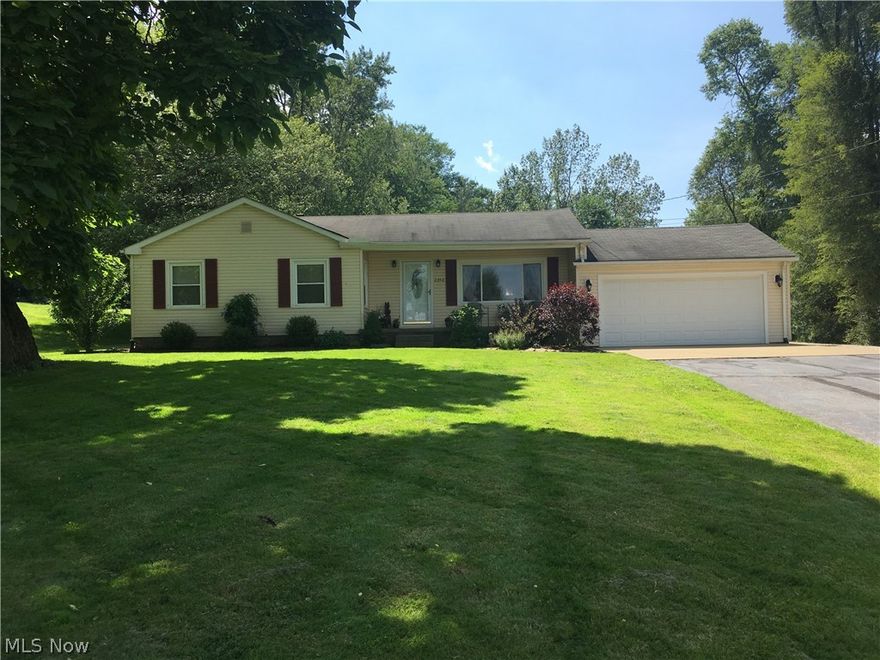 Exceptional floor plan with this newly remodeled 4 bedroom 2 full bath ranch in a quiet popular location.  Year round enjoyable living and easy entertaining with  the large open kitchen which flows into a lovely sun room then onto outdoor 16 x 32 new wood deck area. Lots of natural light! Nice attached 2 car garage with 6" insulation walls R-13, water and attic storage. Lots of parking with extra drive to backyard, storage shed, fire pit, and a raised garden bed on a beautiful 1 acre lot complete with city sewer and water on the Woodridge School District line. Brand new kitchen has pull-outs, soft-close drawers, lots of counter space, breakfast bar, and canned lighting. Appliances include refrigerator, stove/oven, dishwasher, garbage disposal, microwave, washer and dryer, central air, central vacuum, 4 ceiling fans, reverse osmosis system, plus water softener. Vinyl sided, vinyl windows, glass block, 100 amp electrical box, 12" attic insulation.  All new light fixtures, interior doors,