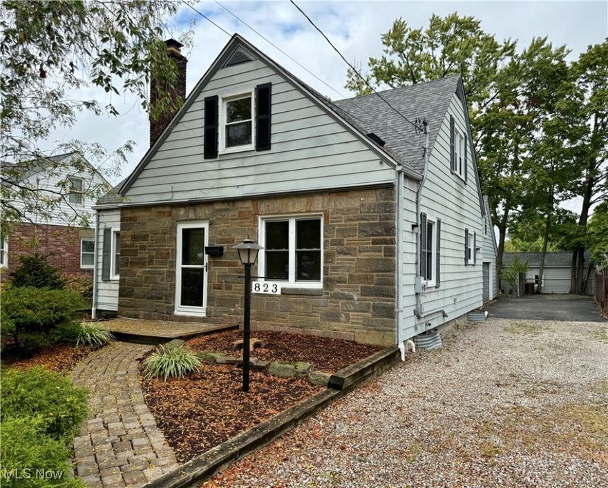 Step into this move-in ready 4-bedroom, 2 full bath Cape Cod in Cuyahoga Falls that’s packed with updates and charm! With almost 1,300 sq. ft. of thoughtfully designed space, this home checks ALL the boxes: a spacious 2-car attached garage with bonus storage above, and a light-filled 3-season porch/breezeway that’s just been refreshed with brand new paint and carpet—perfect for coffee mornings, game nights, or a spot to kick off muddy shoes after the park. Outside, enjoy fresh landscaping and peace of mind with a brand new 30-year architectural shingle roof on both the home and garage. Inside, everything feels new with fresh paint, two completely remodeled bathrooms, granite countertops in the kitchen with new hardware and fixtures, new stainless appliances, durable LVT flooring and refinished hardwoods that keep the classic character. Other big-ticket updates include vinyl windows, a brand new LG mini-split A/C unit, updated boiler system and professional basement waterproofing - giving you comfort and confidence! The location is unbeatable—close to Portage Crossings, Route 8, local parks, and only a few blocks from the brand new Cuyahoga Falls 6–12 Grade Campus. If you’re looking for a stylish, updated home in a prime spot, this is the one you don’t want to miss. Schedule your showing today!