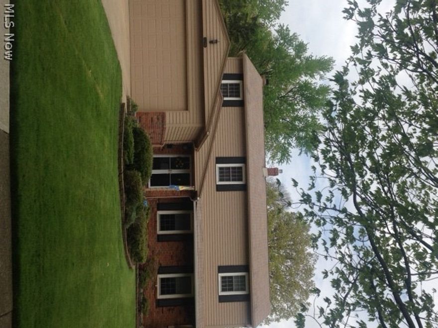 Classic 4 bedroom  colonial house over 2600 sq.ft., with Gracious formal living room, New  windows through out,lovely formal dining room with crown molding, bay window looks out to large open yard, Over sized Eat in Kitchen, granite counter tops, gas cook top range, matching refrigerator, dishwasher, double ovens, loads of storage in updated kitchen, opens to family room with gas fireplace, patio door in family room opens to a large covered porch  and deck ,Laundry  room on first floor includes washer and dryer, Large  master bedroom 20X14 with master bath, dressing room and another large bath in hallway.  4 bedroom house, finished rec-room, central air conditioning, attached two car garage with nature stone flooring.  Meticulously maintained, replacement windows throughout, beautifully landscaped.  Ready to move in and enjoy.  Minutes to University Circle, Parks and Shopping.