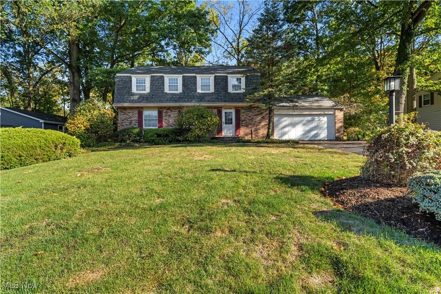 Brand new roof October 2025.  Nestled in a serene, wooded setting, this beautiful two-story home offers the perfect blend of privacy, nature, and comfort. With 4 spacious bedrooms, 2.5 bathrooms, and over 2,000 sq ft of living space, this property is designed for both relaxation and entertaining.

Step inside to find a warm and inviting floor plan featuring a bright living room, family room with gas logs in a formerly wood-burning fireplace, a large kitchen with newer appliances and space for an island, and a cozy dining room overlooking the trees and creek. The primary suite includes a private bath and generous closet space, while three additional bedrooms provide flexibility for family, guests, or a home office.  

The outdoor living space is truly a retreat. A multi-tier deck flows seamlessly into a charming gazebo, all overlooking a tranquil creek that winds at the base of the the property. Surrounded by mature trees, this backyard oasis offers the ideal backdrop for morning coffee, gatherings with friends, or quiet evenings in nature.

Additional highlights include an attached 2-car garage, partially finished basement, and easy access to local shops, schools, and parks—while still feeling worlds away.