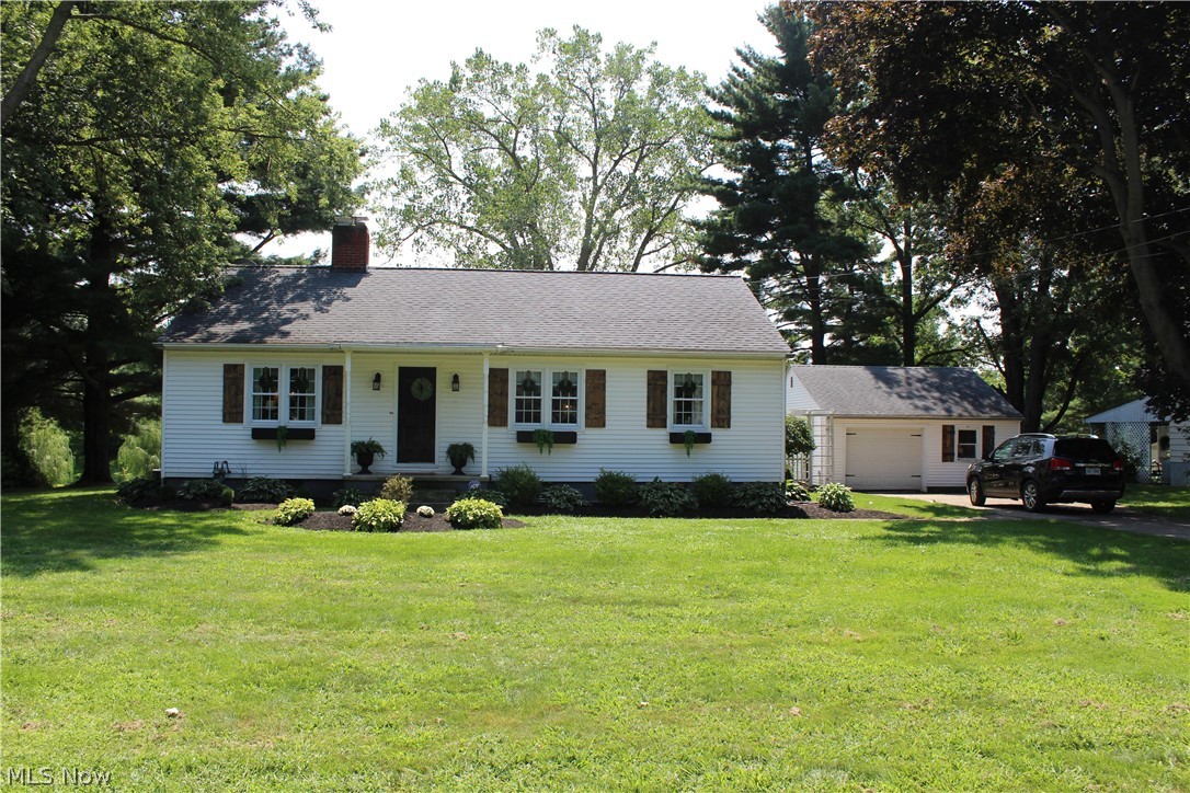 Country living near the City: Beautifully remodeled Huron Home with nearly an acre and a half of tree lined property. In addition to the modern updates, this stylish ranch has updated electric, waterproofed partially finished basement, and new windows. Storage abounds in the two car garage/shop with full attic, along with even more attic storage in the home and in the partially finished basement as well. This home is a must see!