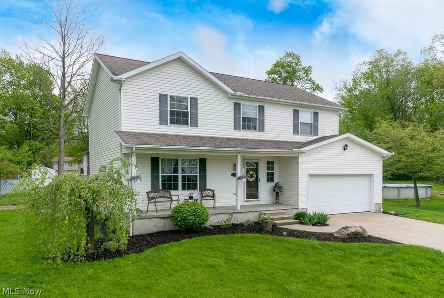 Welcome home to this beautiful 4 bedroom colonial located on a dead end street right in the heart of Garrettsville. Walk in the home to a large living room with an adjoining formal dining room or office.  The large kitchen with a breakfast bar has lots of cabinet space and extra space for a table or family room. Enjoy access to the back patio through sliding glass doors.  A great place to entertain. A half bath completes the main floor. The second floor offers a large master bedroom with vaulted ceilings, an entry to the full bathroom, and a large walk in closet.  Up stairs has 3 additional bedrooms and a full bath. The basement has over 950 sq. ft. and is awaiting your finishing touches. There is a 2 car attached garage with a heater.  Enjoy the outdoors with a partially wooded lot and heated pool.  Close to dining and shopping in historical Garrettsville.  Centrally located between Akron, Cleveland, and Youngstown.  Schedule a private showing today.

The Sellers favorite part of the home:   "I  like the neighborhood.  It is a great place to raise a family.  We liked cutting through Zupancic to walk to the football games.  The dead end street is a safety plus because you know what cars should be there.  The master bedroom was the favorite room in the house.  It is roomy and I like the walk in closet/"