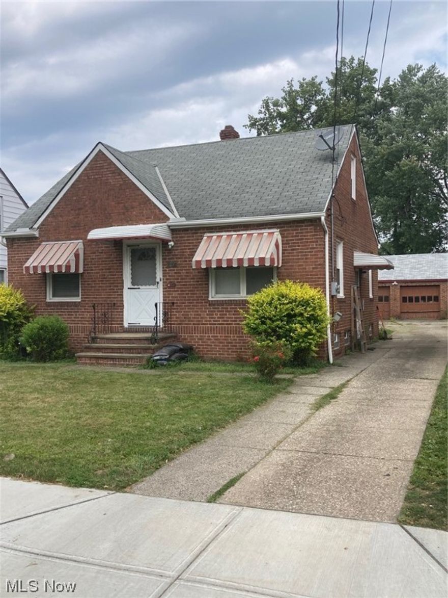 Cute 3 Bedroom awaiting your personal touches, Spacious backyard with a 2-car detached garage.  Large 1 Bedroom upstairs and 1 full bath on the ground floor, Eat in Kitchen with partially finished basement.