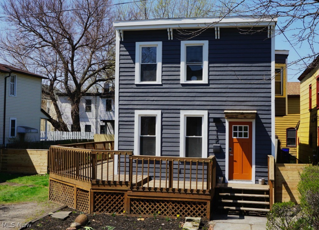 Contemporary Renovation to a Single Family Home (on a double lot!) in the Duck Island neighborhood of Cleveland. With an amazing location, its only a 2min walk to West Side Market and West 25th, 2min walk to Tremont, 2min drive to Downtown Cleveland. Exterior has all new paint, brand new energy efficient replacement windows and flashing, new exterior doors, lighting. The double lot yard is large with complete perimeter fencing, a huge wrap around deck, and storage shed. 1st floor features new flooring, lighting, painting throughout. Kitchen is complete with all new 'Silestone' quartz countertops, new cabinets, new subway tile backsplash, and high-end stainless steel appliances. 1/2 bath has new fixtures with ceramic tile floors. 2nd floor has all new carpet, lighting and paint as well. 3 good size bedrooms, all with large closets and recessed lighting. The full bath has all new fixtures with subway tile shower surround and ceramic tile floors. The home also feat