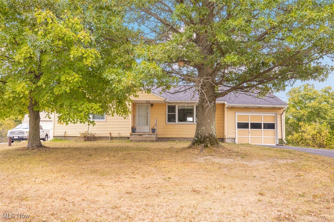Charnin 4 Bedroom/1 Bath Ranch! This home offers everything you need! Kitchen and bath were updated with Quartz Countertops and new cabinets (2021). New roof (2023) New windows (2016) Waterproofing and Sump-pump (2021). New HVAC system (2016) Reverse osmosis water system (2016). There is a 1 car attached garage and a detached 4 car garage! Pole Barn for additional storage! Above-ground Salt Water Pool (15x30) and a large playground for family fun! The multi-level deck was added and provides plenty of space to enjoy the outdoors!