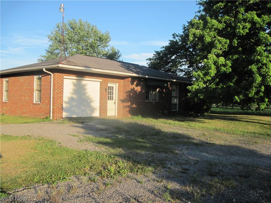 Property includes approx 12.64 acres total (includes home site plus additional 11.64 agricultural acres). All brick home in excellent condition for age. Very nice, quiet neighborhood.  Immediate possession on transfer.  Close to Alliance and Hartville.