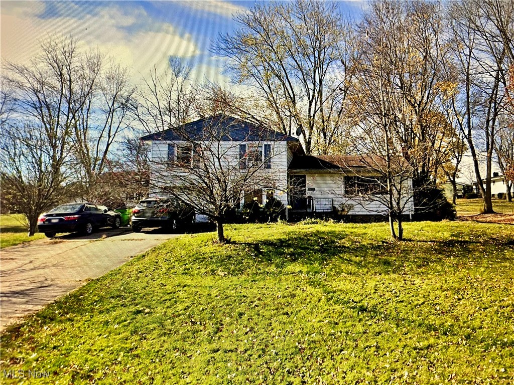 Wonderful 4 level split home on large lot with mature trees. Located just minutes away from shopping, restaurants and Wooster City Schools. Updated kitchen and baths. All new flooring and freshly painted. There is a huge deck overlooking the rear yard. Great opportunity for any buyer to call home.