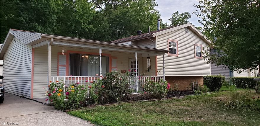Welcome home to this beautiful split level complete with 3 bedrooms and 2 full baths.  spacious kitchen with adjacent dining room and living room on the first floor.  The master bedroom with a sitting area, access to outside, laundry room and full bath is situated in the lower level of the home.  The second level features a large and medium bedroom along with another full bathroom.  Freshly painted.  The dining room features a sliding door to the fenced-in backyard.  The home comes with a 2 car detached garage.  Close to schools, shopping centers, major highways, park, library and medical facilities.