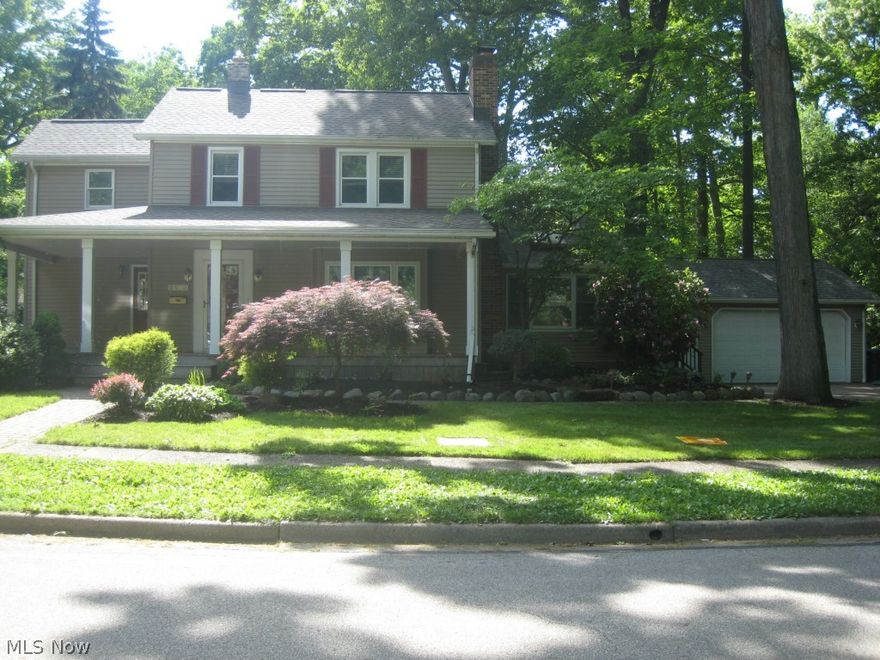 "River Estates" colonial nestled in the trees with welcoming front porch. Meticulously remodeled throughout. Beautiful hardwood flooring throughout the first floor living and dining areas.  2 story great room addition, 4BR/3 full baths, Master suite with Jacuzzi, a step-in shower and walk-in cedar closet.. Convenient Second floor laundry with ample storage.  First floor office and sun room, too.  Custom kitchen provides great counter space, cabinetry and pantry.  Finished lower level and huge work area perfect for the handyman or car buff.  Wrap around deck for summer fun and entertaining.  Oversized 2.5 car garage.  Schedule your appointment now.