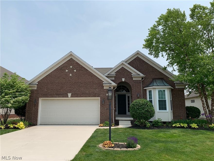 Welcome to 3,600 SF of premium finished flex space!  Superlatives are justified for this stunning New Hampton ranch style home; sophisticated in style/functionality, decor. Upgraded throughout, this dream home features a stunning kitchen w/ custom layout, extended hdwd flrs; surplus of cabinets and Volga Blue granite; glass tile backsplash, elegant lighting and more.  Master ste features custom wall art, volume ceiling, lg walk in California closet, dbl sinks.  Light, bright welcoming foyer & soaring ceilings offer potential gallery space before greatroom w/gas fireplace. LLhas 5 rooms + bath + storage! 1500 sq.ft. is premium-fin flex space that allows for up to 4 bedrooms in this home! Includes NYC loft inspired bath w/ exposed wall treatment, edgy lighting and open tiled shower, entertaining spaces include plush theatre room, lg. finished bar and gathering area with stone and wood elements plus built in's. Also lg. brightly lit exercise room, lg. rec room, fully finished guest bdrm,