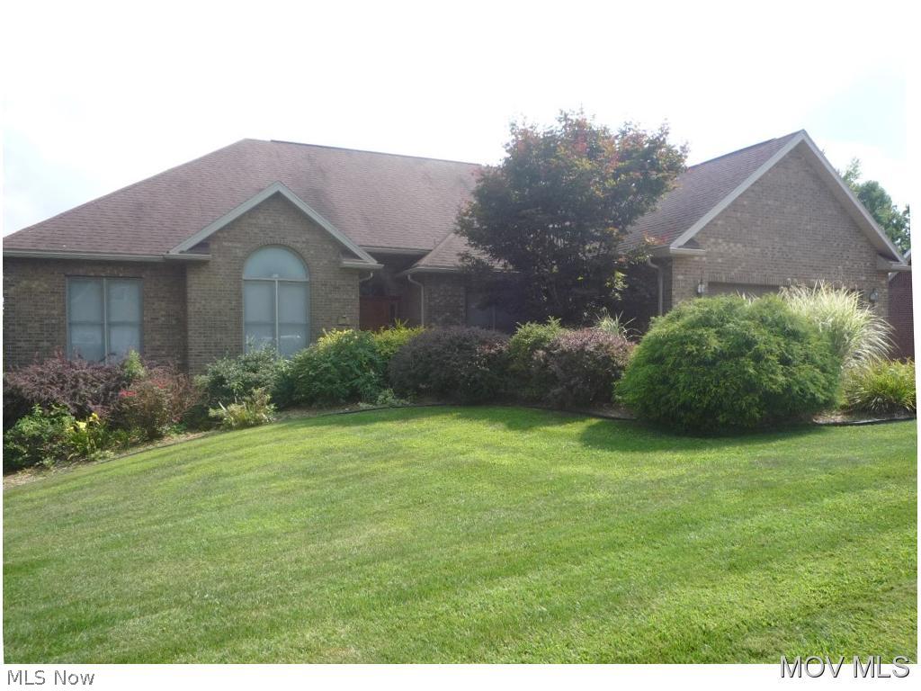 Beautiful all brick home with a country atmosphere. Open floor plan with hardwood floors and a gas fireplace. Wonderful cul-de-sac location. Solid six panel doors,crown molding, wood trim,and custom built-ins.Kitchen has new 5 burner stove & convection oven, new french door refrigerator, & large pantry. 1st floor laundry w/ new washer and dryer, fireside family room, 4 bedrooms and 3 1/2 baths. Large rear deck w/ hot tub. Established landscaping. Large lower level walk-out basement w/ rec room. Freshly painted inside,new carpet in bedrooms, new cellular blinds, new toilets,A/C and water heater Elem: Warren Elementary School Elem/Bus: N JrHigh: Warren Middle JrHigh/Bus: N High: Warren High School High/Bus: N Fire: VOL Police: SHF ;SQFT=Fin L1:2116, Fin L2:390, Fin Bsmt:390, Fin Above:2506, Fin Total:2806, Unfin Bsmt:1726, Unfin Above:1726;GAR= 2 Car Att, Opener(s)