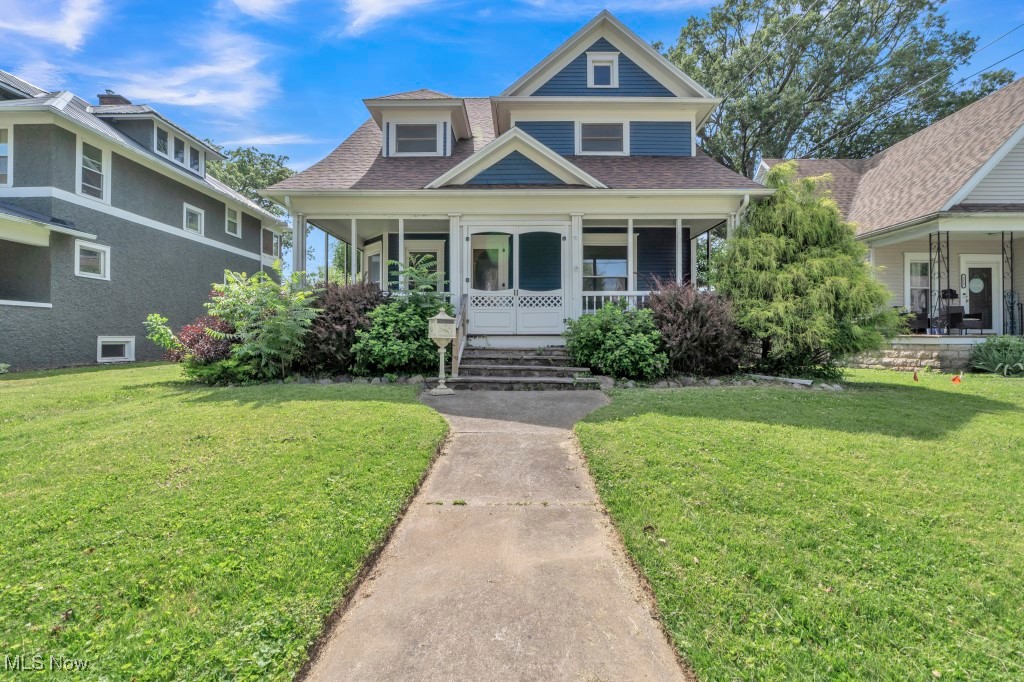 Spacious Colonial on a quiet street boasts 1,896 square feet, with 3 bedrooms and a walk-up attic that could be finished for additional living space! Full bath on second floor has large walk-in shower, clawfoot tub, built-ins and a large vanity area with separated toilet area. This beauty also has natural woodwork, tall ceilings, a large kitchen with loads of cabinets and counterspace, all kitchen appliances, a gorgeous dining room with built-in cabinets and patio doors leading out to a wooden deck, and great family time space ~ both a living room and a separate family room/office area that can be closed off by pocket doors! Loads of natural light throughout. So much character and loads of natural light throughout! All this home needs is a little TLC! Relaxation beckons you to the large covered porch or the backyard deck - take your pick! Roof, HWT, and central air approx. 5 years old. This one won't last long!