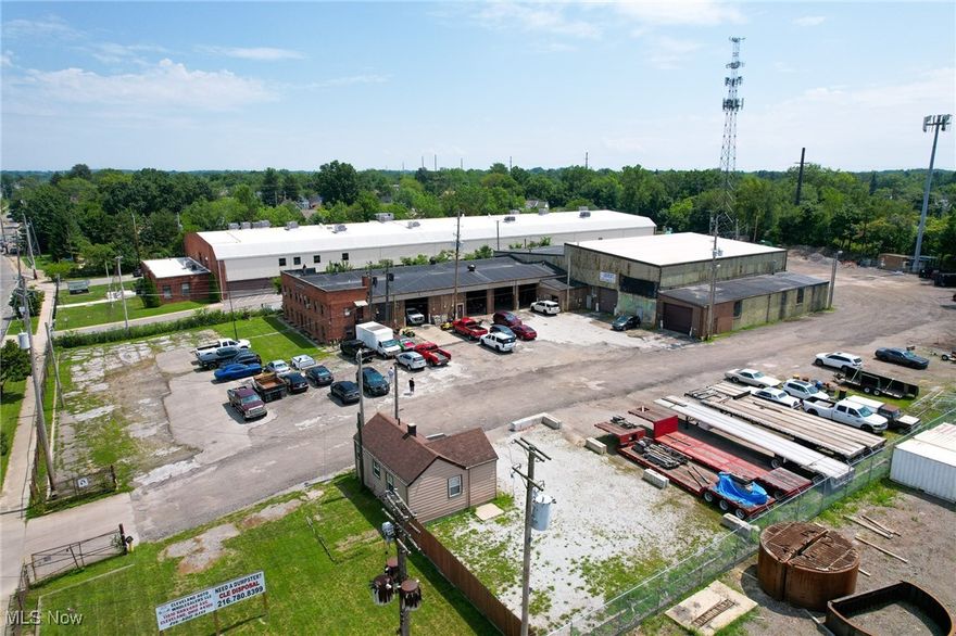 Let’s Make It Sweet to Own and Invest — 11910 Harvard Ave, Cleveland OH

Now offered at $1,199,000, with the seller open to seller financing and creative deal structures.

Located just 15 minutes from downtown Cleveland with easy access to both the East and West sides, this light industrial-zoned property offers a rare opportunity for owner-users or investors seeking versatile space with built-in income and even more potential to grow. The site features five buildings—four connected structures and one stand-alone office that resembles a home. Total space is 26,928 sq ft, including 2,049 sq ft of office space. One office is zoned for a car lot, and the stand-alone office has been fully renovated, making it move-in ready for many uses. The front office downstairs has also been remodeled, offering a clean and professional space for immediate use. One building includes two overhead cranes—ideal for industrial or manufacturing operations.

There are 10 drive-in doors for seamless access across all spaces. Multiple tenants currently occupy the property, each in different areas, with no active leases. This gives a new owner the flexibility to adjust rental rates, create lease structures, or occupy space themselves. Tenants have expressed willingness to sign leases prior to transfer if desired.

Additional income opportunities include leasing both office spaces and monetizing the generous outdoor area, which is currently used for truck parking. The side lot can also be divided and rented out for additional vehicle or trailer storage. Two on-site cell towers may provide even more future value. The owner has invested in several updates, including a complete tear-off and replacement of the main warehouse roof with all new materials.

There’s significant upside potential in raising rents, achieving full occupancy, and maximizing outdoor utility. Whether you're an investor, owner-operator, or entrepreneur, this versatile property is ready to perform.