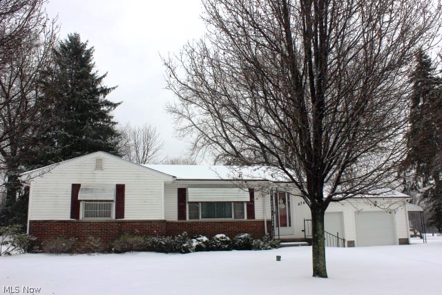 One owner & it shows! This 3 bedroom ranch is centrally located in Green on pretty 1/2 acre lot* Updates include windows (except living room), siding, doors (2002), waterproofed (approx. 2009), air conditioner (approx. 2012)* Hardwood floors under carpet* Dining room with built in china cabinet* Ceiling fans- bedrooms & kitchen* 12 course basement with rec room, built in cabinet & shelves, fireplace (pre fab approx. 6 yrs), glass block windows & work bench* 2.5 car attached garage with built in cabinets, updated doors, storage room & hot/cold water* Grape arbor, storage barn & patio* Home Warranty provided*