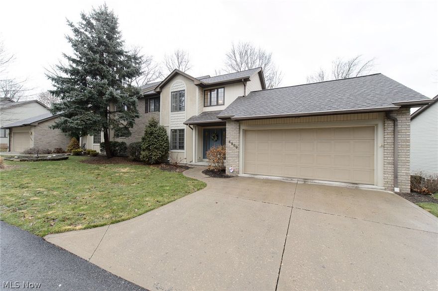 Stunning luxury park like setting condo in the heart of Jackson Twp! Stunning 2 story great room with fireplace and lots of transom style picture windows! Gorgeous newly tiled open foyer. Beautiful kitchen with granite counters and new tile floors. Convenient  1st floor laundry & 1/2 bath! Large open formal dining room with French door leading to a private deck w/ security shutters for a lock & go lifestyle! Large master suite with 2 walk in closet and master bath!  Junior suite with full bath including Jacuzzi tub!!! Loads of space to roam in the finished walkout lower level with patio!  Lots of storage, work & play areas!  This condo boasts over 2200 sq ft including the finished walk out lower level! 2 car attached garage, located on a quiet cul de sac. Recent upgrades include new roof, skylights, carpet, tile and furnace!!!! Security system & electronic security & storm shutters for true lock and go living! This location couldn't get any better tucked away but so close to it all sho