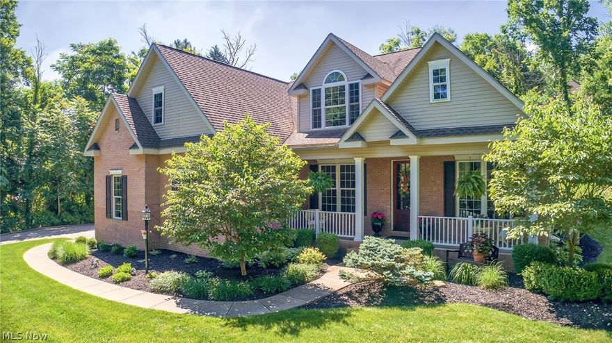 Quality custom built classic cape cod located in one of the most desirable north end subdivisions. Features stately architectural design with its gables, dormers, high ceilings and abundance of natural light. Beautiful hardwood flooring throughout the first floor. Fully loaded gourmet chef's kitchen with custom cabinetry, Corian counters,  ceramic tile flooring, island, eat in breakfast area with views of the private back yard. The great room features cathedral ceilings, fireplace, and access to the rear patio. Perfect room to sit and relax while watching the outdoor activities or just the sunshine through the abundant extra large Florida windows. Formal dining room with nice flow from kitchen and large enough to host many dinner guests. The master suite has all the features you would expect from an executive style home. Exterior features include a curved sidewalk with professional manicured landscaping, brick trimmed front porch and 8'entry door to the foyer. All finishes completed wi