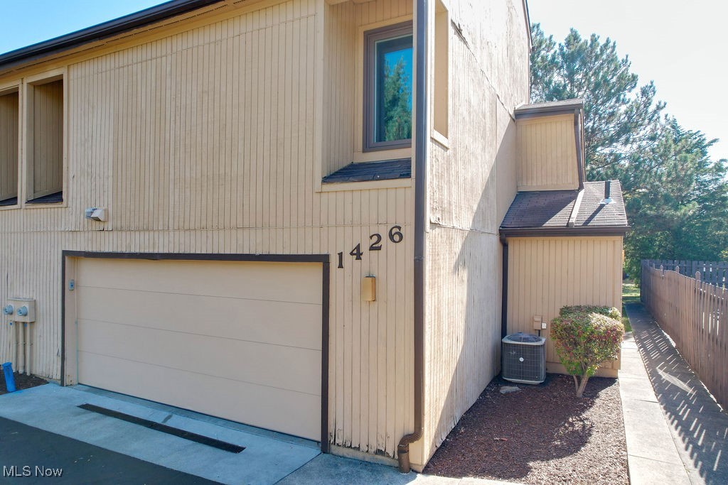 Don't miss this beautifully updated 3-bedroom, 2.5-bath condo located just a short walk from Kent State University. This spacious home features modern finishes throughout, including an open-concept main living area, spacious kitchen with updated appliances and a convenient 1/2 bath located on main level. The dining room and living room feature sliding glass doors leading to a private patio area. The second story features a convenient laundry area, main bedroom with ensuite bathroom and 2 additional bedrooms and a full bathroom. All the bedrooms feature ample closet space. Enjoy the convenience of a 2-car attached garage, in-unit laundry, and ample storage. Perfect for anyone looking to live close to campus and downtown Kent, this low-maintenance property offers comfort, style, and an unbeatable location. Sellers have taken care of some big items so this home can be maintenance free for the new owners. Updates: Front door 2020, Second story windows 2021, Washing machine 2021, Garage door 2021, Furnace and Central Air 2022, Armorlike Coating on Garage Floor and garage lighting 2022, Stove 2022, Hot water tank, shut off valves and pipes 2023, Refrigerator 2023 and Round Window above front door 2025. Freshly painted and cleaned through out! Do not let this one pass you by! Schedule your private tour today.