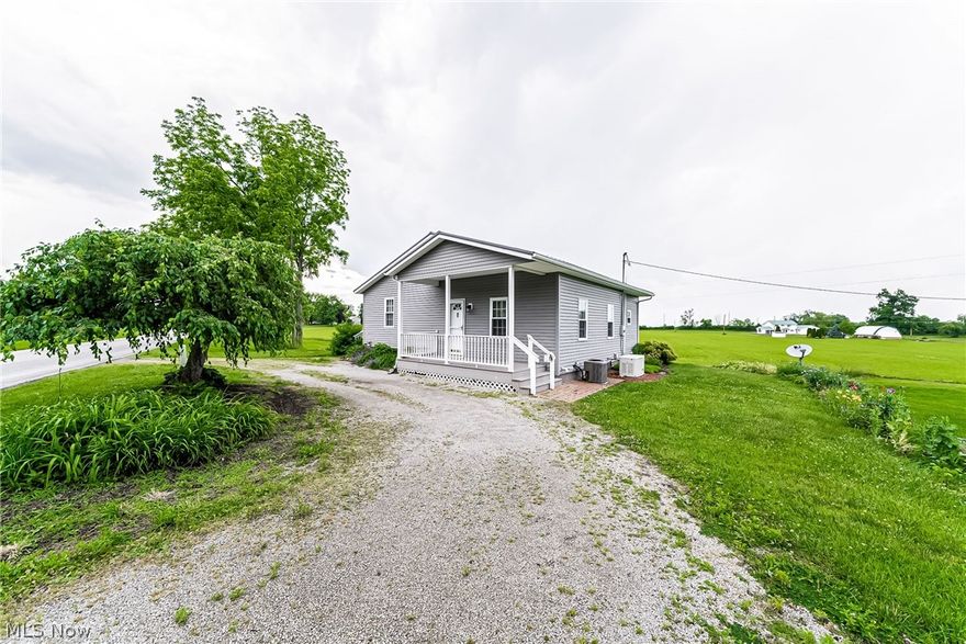 Country living meets convenience with this beautiful, 2-bedroom ranch. Situated on two acres, the yard has been manicured to perfection and offers unlimited potential for home additions or garages. The heated outbuilding is 30x40 and perfect for a handyman or car enthusiast. Upon entering, you’ll immediately notice the open floor plan that seamlessly connects the living and dining room with the kitchen. The spacious master bedroom features a glass sliding door which provides tons of natural lighting and a nice view. Just outside, a wraparound porch is a great space for entertainment or relaxing. Nothing else to do but move in — hurry, this one won’t last long!