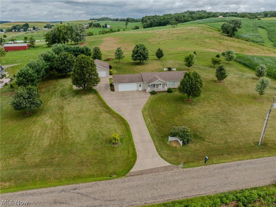 Auction 8/20/2024 4:00 PM - A beautiful 2-acre ranch home estate nestled in the peaceful country. The home, new in 2006, features 3 bedrooms, 2 full baths, an open concept kitchen, dining, and living room area along with a laundry area. The attached 2 car garage is oversized and provides additional storage. The home is on a crawl space. Additionally, the property features a 30’x40’ detached garage, fully insulated with propane gas heat, an ideal storage or work garage. The utilities include a private well & septic, electric heat pump furnace. The 2-acre lot features a sprawling concrete drive, is all level providing ample yard area and maturing trees and landscaping. With beautiful views of the countryside, this property deserves your attention. Make plans to join us for the preview and see for yourself what all this home has to offer.