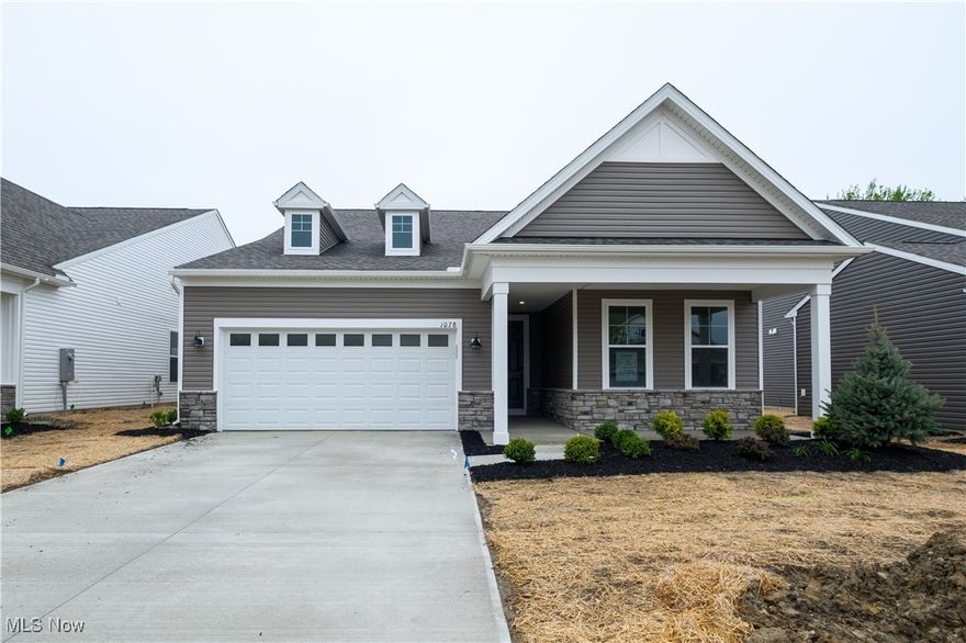 Enjoy resort style living in your beautiful well-appointed modern ranch style home in Columbia Station's 55+ Hickory Greens Community. The Palmary new home design boasts an open layout perfect for entertaining. This Quick Move-in home offers a private Owner’s Suite nestled at the back of the home complete with owner's spa and walk-in closet. Each home is built with quality that you've come to expect from Del Webb, a Pulte Group builder. The home boasts 2,363 square feet, 2 bedrooms, 2 bathrooms, 1st floor office, and 2nd floor storage room, complete with a covered rear patio overlooking a serene, wooded backyard.  Enjoy dining in your cafe just off the luxury kitchen complete with quartz countertops, built-in appliances, pot filler, walk-in pantry, and 10-foot-long kitchen island.  This features a 300 square foot second floor storage room to replace your need for a basement.

Del Webb community is the perfect place to pursue your passions or find new ones.  Featuring resort style amenities such as a 14,300 sq foot clubhouse, a 5 acre+ walking path, pickle ball and full swing golf simulator.  You will love our opportunities to stay active with a full-time lifestyle director coming soon. You can join social clubs, interest groups and year-round community events.
