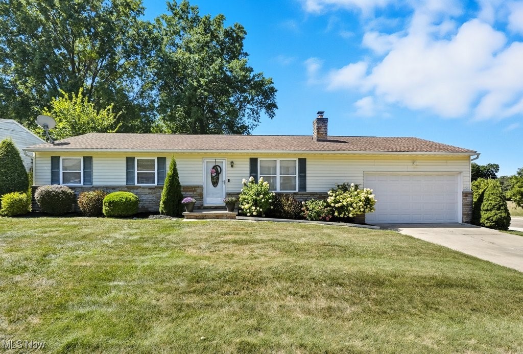 Pride of ownership shines in this charming 3 bedroom 2 bath Ranch! As you enter the home you will notice the open living area. The spacious living room has a woodburning fireplace and updated flooring. The eat in kitchen has been beautifully updated with Amish cabinets, quartz countertops and an Island. The stainless-steel appliances stay. The full bath on the main level has been updated with double sinks and heated floors! All 3 bedrooms are on the main floor. The finished basement is a true bonus with over 600 sq ft of living space. Perfect for any type of gathering, with a wet bar, microwave and refrigerator. The second bath has been updated with a walk-in shower and heated floors. The laundry area has a sink with so much cabinet space. The washer and dryer will stay. The basement also has an unfinished area perfect for a workshop or extra storage. Let's not forget the beautiful deck with hot tub that overlooks large backyard. There is so much space to enjoy, with a fire pit and extra area for sports and leisure. Perfect for summer gatherings or weekend get togethers. The spacious shed will store all your outdoor equipment. The garage is an oversized 2 car garage with high ceilings and more storage. Furnace and central air 2010. Roof is 12 years old. Homewarranty is provided.This move in ready home has everything you need both inside and out!