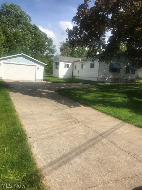 WOW!! Amazing opportunity to own this Spacious Ranch with over 1600 square feet. First floor living featuring 3 bedrooms & 2.5 baths. Great room with a wood burning fireplace perfect for entertaining or relaxing and enjoying the scenic backyard. The roomy eat in kitchen with an abundance of counter space and new laminate flooring. The master suite includes a full bathroom. The entire home has been freshly painted throughout, new carpet, modern efficient windows, furnace and air conditioning. 2 1/2 car garage. Close to shopping, restaurants, parks and highway. A must see.. Call for your private showing.