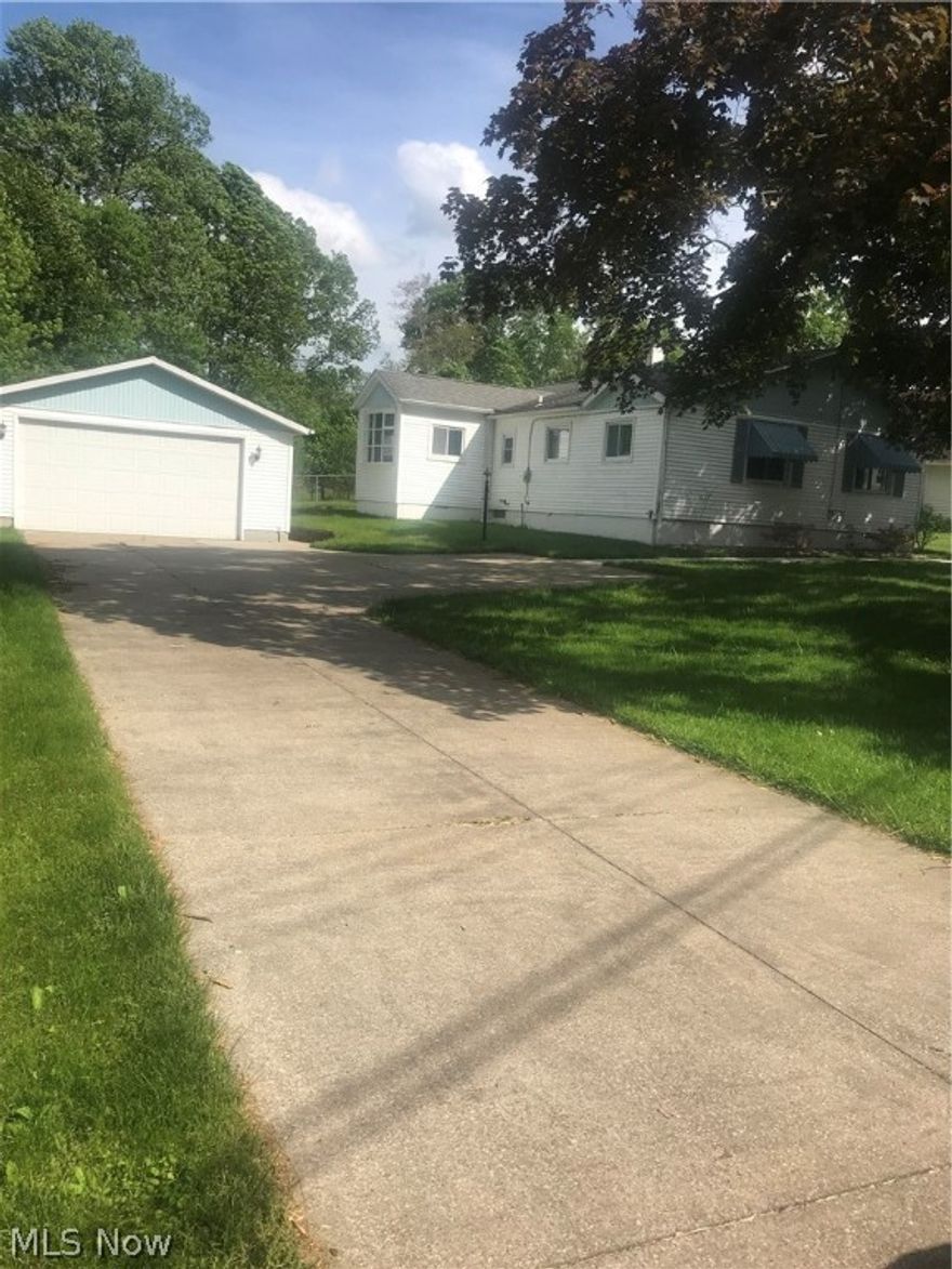 WOW!! Amazing opportunity to own this Spacious Ranch with over 1600 square feet. First floor living featuring 3 bedrooms & 2.5 baths. Great room with a wood burning fireplace perfect for entertaining or relaxing and enjoying the scenic backyard. The roomy eat in kitchen with an abundance of counter space and new laminate flooring. The master suite includes a full bathroom. The entire home has been freshly painted throughout, new carpet, modern efficient windows, furnace and air conditioning. 2 1/2 car garage. Close to shopping, restaurants, parks and highway. A must see.. Call for your private showing.