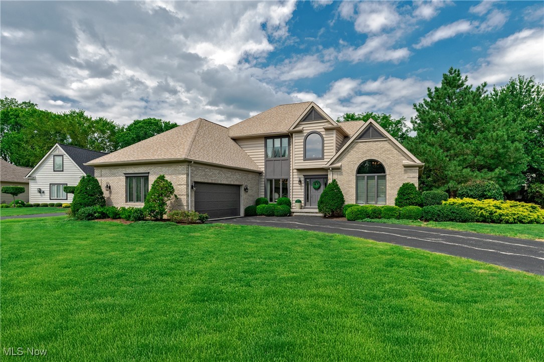 A Golfer’s Dream in Barrington Golf & Country Club! Perfectly positioned on a private cul-de-sac and embracing a half-acre of impeccably landscaped grounds, this 4-bedroom, 3.5-bath custom residence offers sweeping views of the 8th fairway on the Jack Nicklaus Signature Course. Every inch of the home has been thoughtfully maintained and refreshed under the guidance of professional interior designers, ensuring a harmonious flow and a versatile floorplan that adapts beautifully to modern life. Floor-to-ceiling windows bathe the great room in natural light, drawing attention to a soaring brick gas fireplace. Seamless indoor-outdoor living unfolds onto an oversized deck and screened gazebo—perfect for both intimate evenings and grand entertaining. The gourmet kitchen blends form and function with granite countertops, white cabinetry, tumbled marble backsplash, and premium KitchenAid and JennAir appliances. Completing the first floor, the luxurious primary suite is a serene retreat, featuring vaulted ceilings, two expansive walk-in closets, and a spa-inspired bath with a Jacuzzi tub and multi-jet shower. Upstairs, two generously sized guest suites each enjoy private baths, connected by a shared travertine-tiled shower. The finished lower level offers endless possibilities: it includes a large entertaining area with a wet bar and a custom entertainment center, a fitness area, and a bedroom suite including a full bath with a beautifully tiled steam shower. Recent upgrades include luxury vinyl plank flooring, designer lighting, and custom landscaping enhanced with dusk-to-dawn illumination. A 2.5-car garage includes a golf cart bay, workbench, and abundant storage. Just steps from the clubhouse, driving range, and full array of club amenities. With HOA-provided exterior maintenance, a 24-hour manned gate for peace of mind, and a location that embodies the best of golf course living, this property offers an unparalleled combination of luxury, location, and lifestyle.