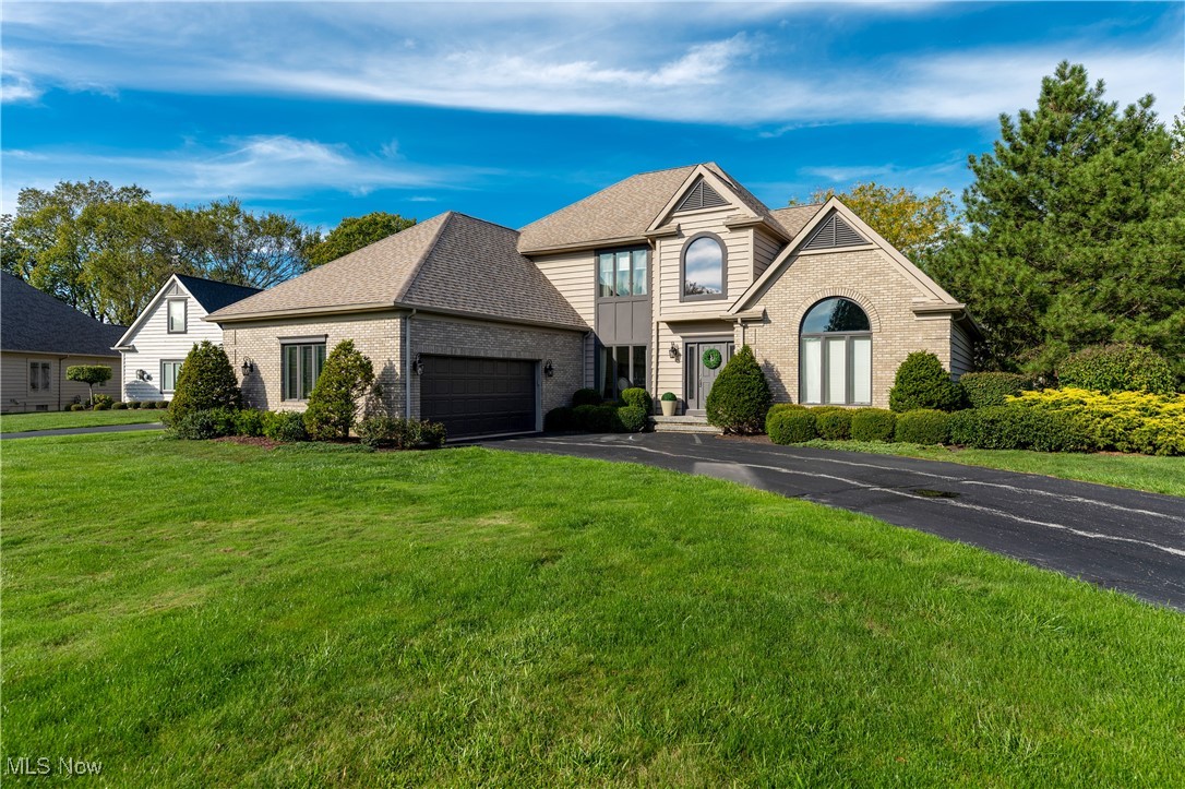 A Golfer’s Dream in Barrington Golf & Country Club! Perfectly positioned on a private cul-de-sac and embracing a half-acre of impeccably landscaped grounds, this 4-bedroom, 3.5-bath custom residence offers sweeping views of the 8th fairway on the Jack Nicklaus Signature Course. Every inch of the home has been thoughtfully maintained and refreshed under the guidance of professional interior designers, ensuring a harmonious flow and a versatile floorplan that adapts beautifully to modern life. Floor-to-ceiling windows bathe the great room in natural light, drawing attention to a soaring brick gas fireplace. Seamless indoor-outdoor living unfolds onto an oversized deck and screened gazebo—perfect for both intimate evenings and grand entertaining. The gourmet kitchen blends form and function with granite countertops, white cabinetry, tumbled marble backsplash, and premium KitchenAid and JennAir appliances. Completing the first floor, the luxurious primary suite is a serene retreat, featuring vaulted ceilings, two expansive walk-in closets, and a spa-inspired bath with a Jacuzzi tub and multi-jet shower. Upstairs, two generously sized guest suites each enjoy private baths, connected by a shared travertine-tiled shower. The finished lower level offers endless possibilities: it includes a large entertaining area with a wet bar and a custom entertainment center, a fitness area, and a bedroom suite including a full bath with a beautifully tiled steam shower. Recent upgrades include luxury vinyl plank flooring, designer lighting, and custom landscaping enhanced with dusk-to-dawn illumination. A 2.5-car garage includes a golf cart bay, workbench, and abundant storage. Just steps from the clubhouse, driving range, and full array of club amenities. With HOA-provided exterior maintenance, a 24-hour manned gate for peace of mind, and a location that embodies the best of golf course living, this property offers an unparalleled combination of luxury, location, and lifestyle.
