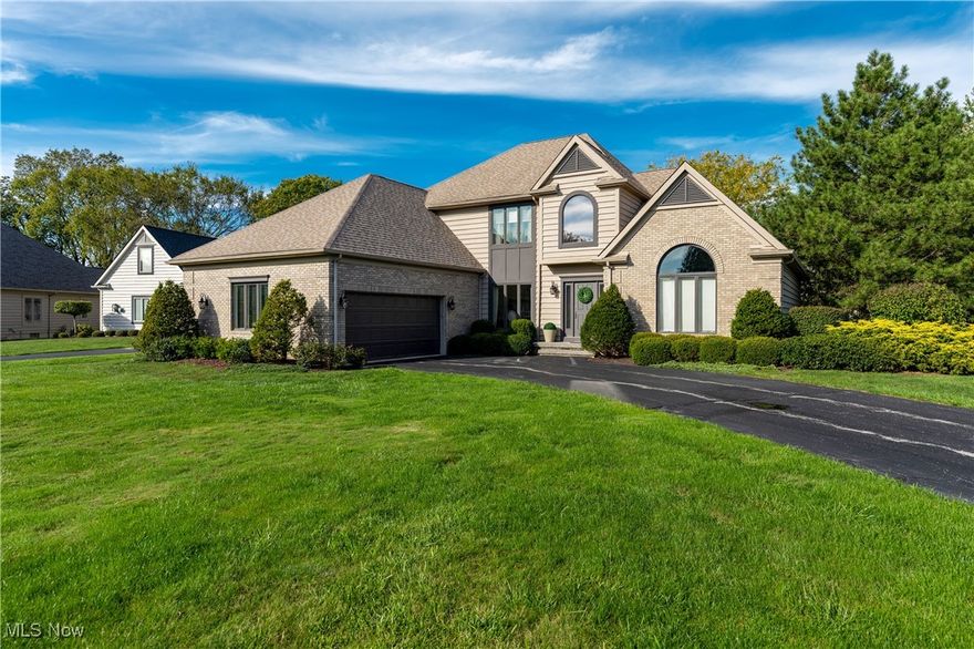 A Golfer’s Dream in Barrington Golf & Country Club! Perfectly positioned on a private cul-de-sac and embracing a half-acre of impeccably landscaped grounds, this 4-bedroom, 3.5-bath custom residence offers sweeping views of the 8th fairway on the Jack Nicklaus Signature Course. Every inch of the home has been thoughtfully maintained and refreshed under the guidance of professional interior designers, ensuring a harmonious flow and a versatile floorplan that adapts beautifully to modern life. Floor-to-ceiling windows bathe the great room in natural light, drawing attention to a soaring brick gas fireplace. Seamless indoor-outdoor living unfolds onto an oversized deck and screened gazebo—perfect for both intimate evenings and grand entertaining. The gourmet kitchen blends form and function with granite countertops, white cabinetry, tumbled marble backsplash, and premium KitchenAid and JennAir appliances. Completing the first floor, the luxurious primary suite is a serene retreat, featuring vaulted ceilings, two expansive walk-in closets, and a spa-inspired bath with a Jacuzzi tub and multi-jet shower. Upstairs, two generously sized guest suites each enjoy private baths, connected by a shared travertine-tiled shower. The finished lower level offers endless possibilities: it includes a large entertaining area with a wet bar and a custom entertainment center, a fitness area, and a bedroom suite including a full bath with a beautifully tiled steam shower. Recent upgrades include luxury vinyl plank flooring, designer lighting, and custom landscaping enhanced with dusk-to-dawn illumination. A 2.5-car garage includes a golf cart bay, workbench, and abundant storage. Just steps from the clubhouse, driving range, and full array of club amenities. With HOA-provided exterior maintenance, a 24-hour manned gate for peace of mind, and a location that embodies the best of golf course living, this property offers an unparalleled combination of luxury, location, and lifestyle.