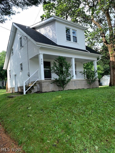 Are you ready to move into a home where nearly everything is brand new? New Roof, New siding, New windows, New electric, New plumbing, New furnace, New AC, New flooring, New kitchen, New bathroom.... in other words, totally remodeled!!! This beauty is beaming and ready for it's new owners! The seller is adding an extra lot with this home to the side of the house in the event that the new owner would like to add a garage someday. The lot to the back of the house could be available as a separate purchase. The colors of the home are in the current styles and trends, and complemented with a stunning granite countertop. Gorgeous isn't even adequate enough for this counter! The full front porch with black spindles adds to another layer of sophistication for the morning coffee breaks. You won't need a storage unit with the full unfinished basement ready for your shelving units! This home should give you many years of peace of mind since every mechanical system has been replaced. Come visi