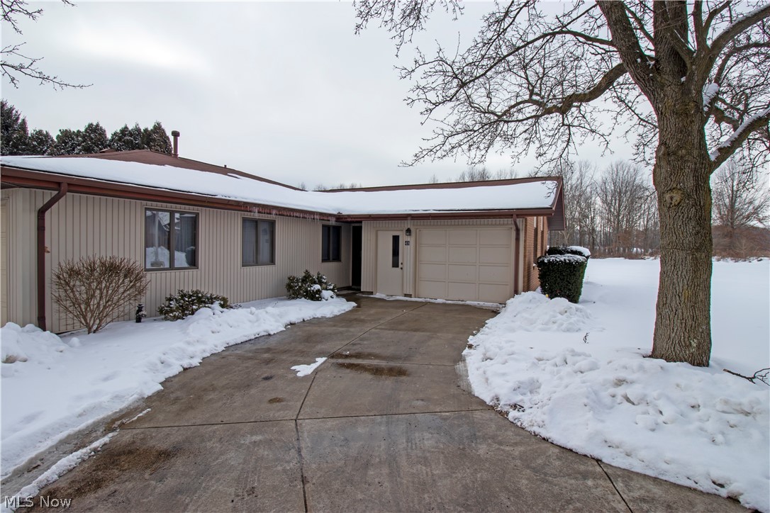 Pristine condo in 55+ community of Smithville Western Commons. Freshly painted. Nicely sized rooms. Kitchen offers lots of cabinet space and is fully appliance. Large master bedroom with access to the bathroom that offers a step in shower with grab bar. Living room has sliding glass doors that walk out to a concrete patio space. Back yard area offers views of green space and wooded area. One car attached garage has lots of built in shelving.