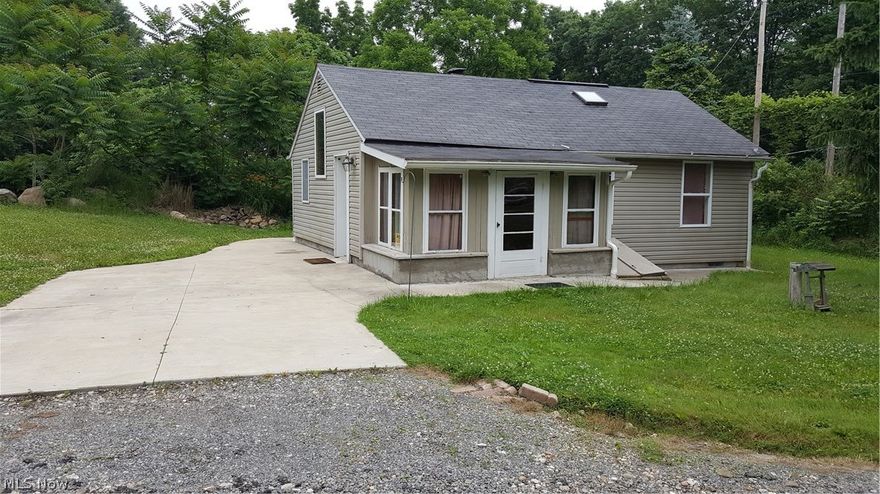 Come see this unique home before it's gone! Newer carpet, hardwood floors, nice sized kitchen and newer patio area.