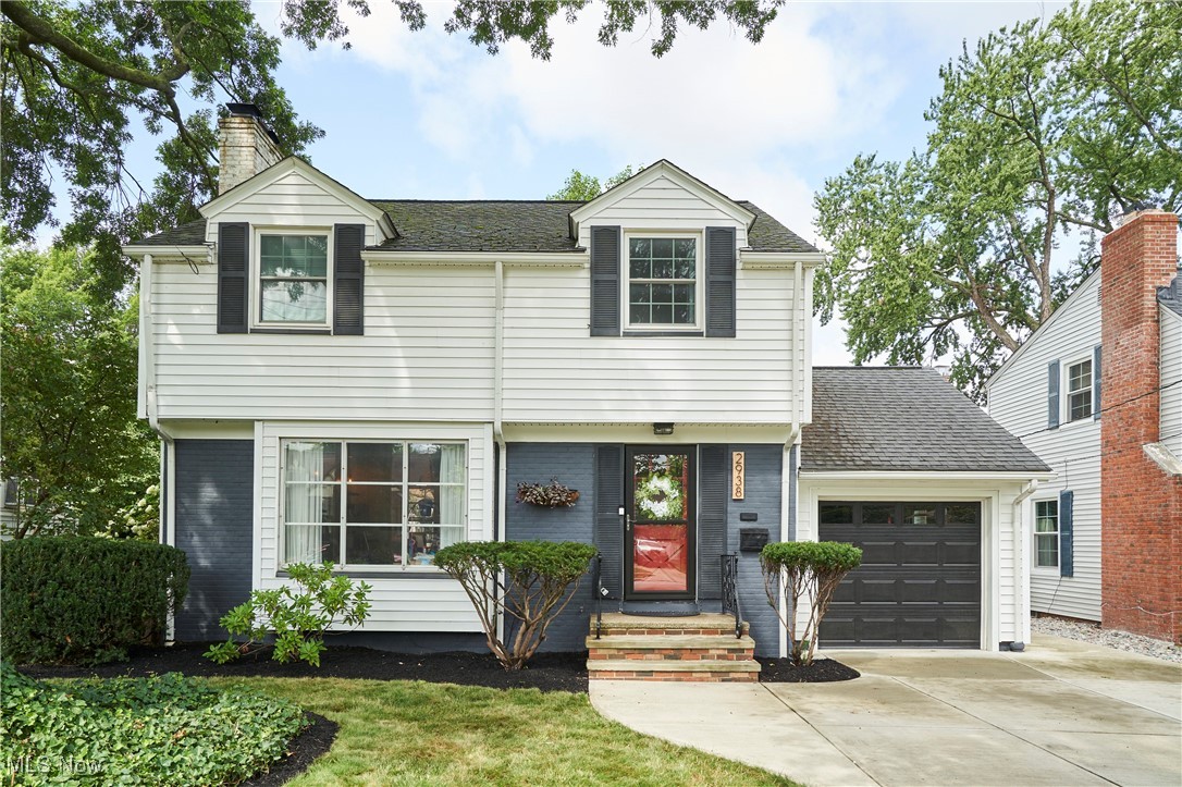 This beautifully renovated 3-bedroom, 2.5-bath Colonial in highly sought-after Rocky River blends timeless charm with modern design. The open-concept main floor features rich hardwood floors, abundant natural light, and a seamless flow from the living room to the kitchen and dining spaces. The inviting living room offers a cozy gas fireplace and large picture windows. The updated kitchen is a true showstopper with quartz countertops, a marble backsplash, farmhouse sink, stainless steel appliances, a gas range, wood-plank ceiling, and custom cabinetry with open shelving—part of a full kitchen renovation completed in 2022. The adjacent dining room boasts built-in storage and floating shelves, creating the perfect space for entertaining. Enjoy year-round outdoor living on the screened-in porch, which opens to a landscaped backyard with garden beds and a brick patio. Upstairs, three spacious bedrooms and a full bathroom. The fully finished basement provides an additional living area with a wood-burning fireplace and an updated full bathroom. Recent upgrades include a new furnace (2023), hot water tank (2023), kitchen renovation (2022), and washer and dryer (2022). With hardwood floors throughout, fresh interior paint, and an attached one-car garage, this home is move-in ready and perfectly located near parks, schools, shopping, and dining.