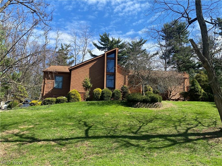 Welcome home to 68449 Greenwood St. in St. Clairsville. Wonderul contemporary one story ranch home in a seclueded, relatively private neighborhood. This beautifully maintained 3-bedroom, 2-bathroom residence offers over 2,200 sq. ft. of living space, designed for both relaxation and entertaining. The heart of the home features a warm, inviting living area anchored by a classic fireplace—perfect for chilly Ohio evenings. The spacious layout flows seamlessly into a partially finished basement, offering the ideal "flex space" for a home gym, playroom, or media center, plus a 2 car garage. Step outside to enjoy a lush, 0.73-acre lot that provides plenty of room for gardening or summer BBQs out on the large rear deck. Located just minutes from local amenities and I-70. This is the perfect place to start your next chapter.