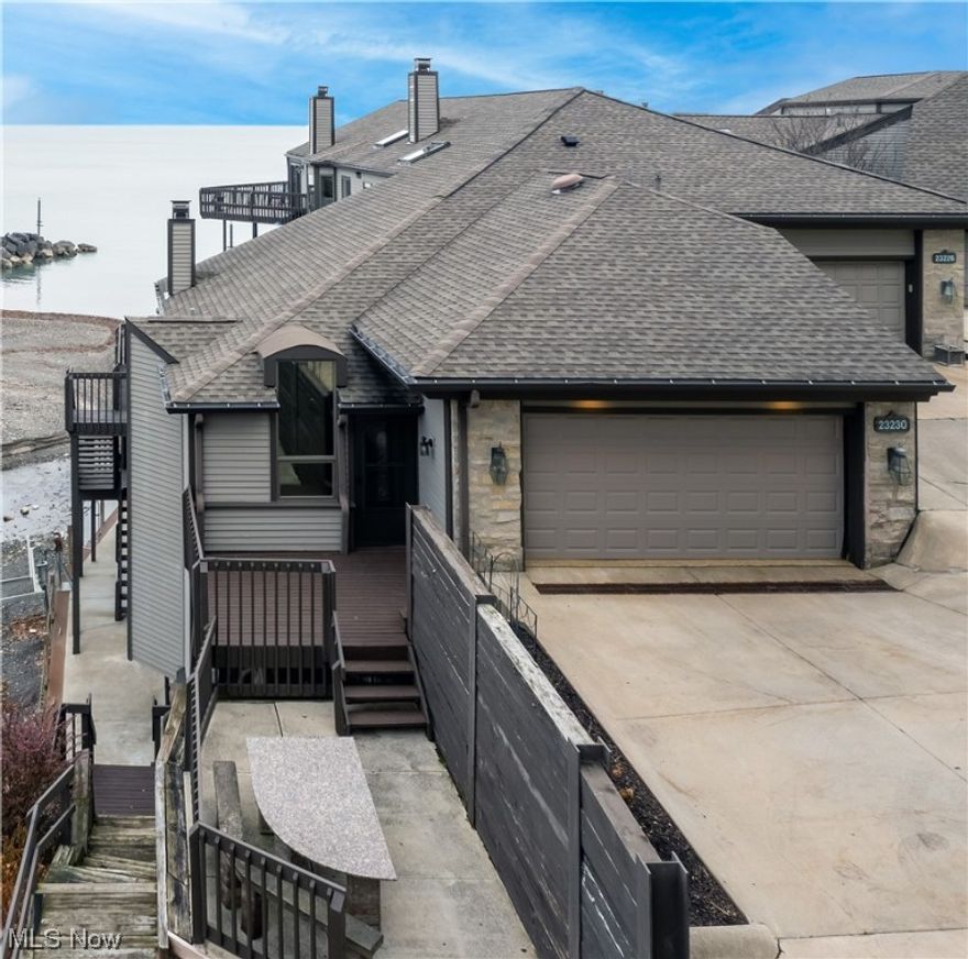 This lakefront retreat offers an incredible opportunity for Lake Erie access. This unique end unit allows you to grab your kayak & paddle out onto the lake enhancing the waterfront experience. This condo boasts the only jet ski/small boat lift on its private dock. This unit underwent a complete renovation that involved gutting it down to the studs. All components such as electrical wiring, plumbing, HVAC system, kitchen, bathrooms, and flooring were completely replaced. Step inside & be greeted by numerous upgrades. The tile flooring, solid wood doors, upgraded moldings, & designer textured walls contribute to the elegance of the space. The gourmet kitchen is a dream for any chef, granite countertops, professional gas stove, & custom cabinets. A wine cellar nook that can accommodate more than 60 bottles of wine, complete with a wine fridge. Floor-to-ceiling windows allow you to enjoy the views of Lake Erie & its sunsets. Step outside you can relax and take in the view from one of the t