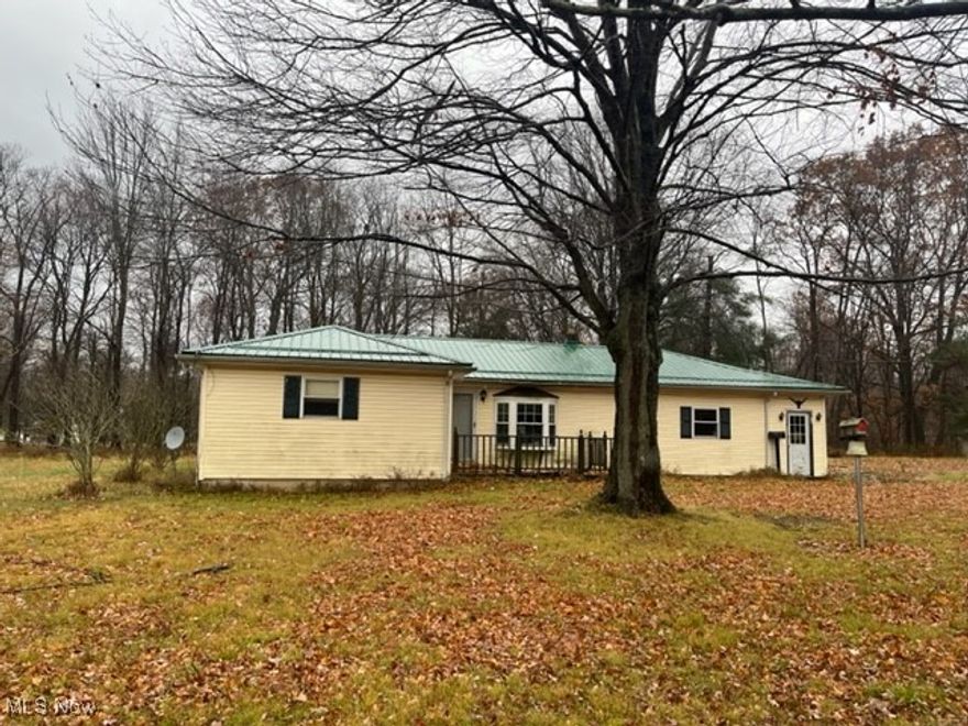 Attention Lake County investors! Ranch style home waiting for your touches to bring out its inner beauty.  Large yard backing to to mature trees. Home has ample room with good floor plan. Hard wood floors under carpeting. Very large master bedroom with vinyl windows and large closet. Kitchen features plenty of cabinets for storage.