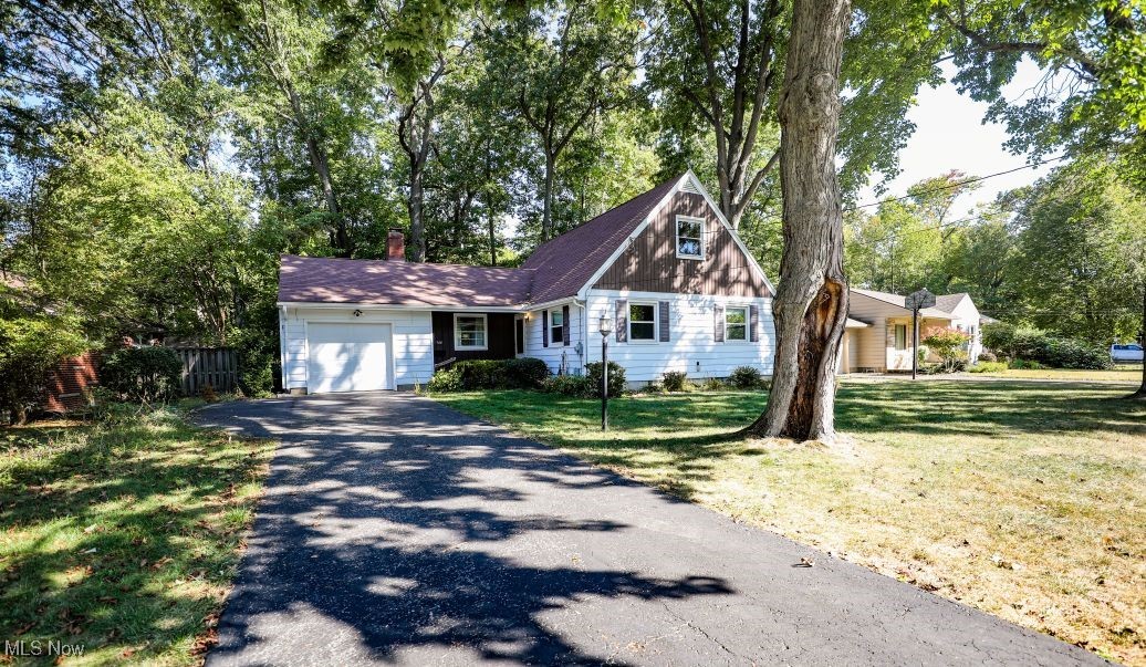 This charming Kent home located at 566 Beech Drive features 1,534 Sq. Ft. of living space with 4 bedrooms including two first floor bedrooms, two full bathrooms (one on each floor), a spacious living room with fireplace, dining room, and eat-in kitchen. Additionally, there is a lovely 3-seasons sunroom off the back of the house, a deck, 1-car attached garage with storage off the back, and a garden shed. There are beautiful hardwood floors throughout the home in addition to beautiful woodwork. Upgrades and improvements over the past few years include: Furnace, A/C, Hot Water Heater, Sump Pump, and Electric Panel. Schedule your showing today!