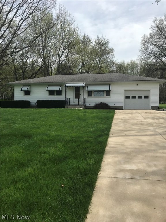 This home is extremely well maintained. One owner home. Beautiful back yard with an outbuilding reminisce of a doll house. Walk off your deck and enjoy the paved walkway around the back of the house. Basement is dry and clean with workshop and lots of room for storage. This is one home you HAVE to see to believe. Hurry, it won't last long.