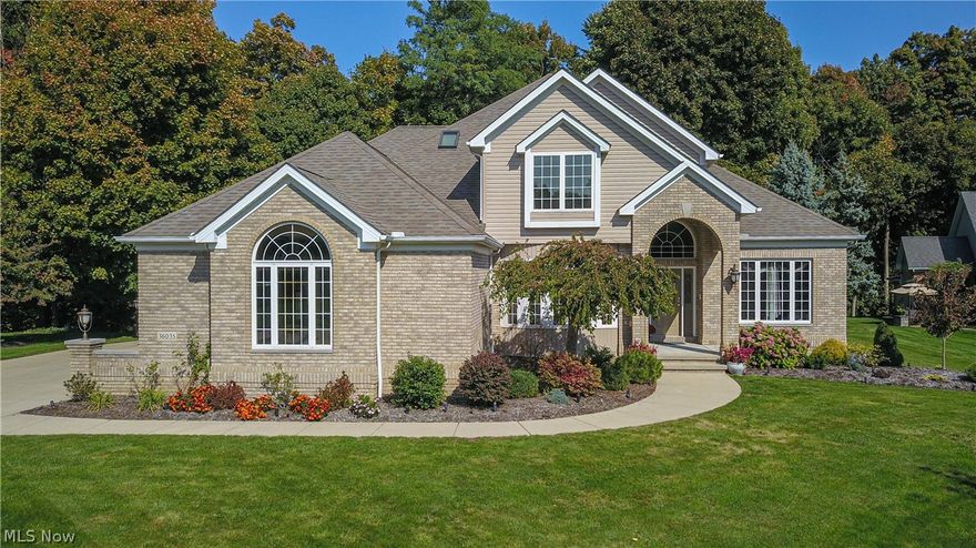 Nestled in the quiet, picturesque woods of Willoughby Hills, this meticulously maintained custom built home is move-in ready and awaiting new owners. Enter the two-story foyer in neutral colors that leads to the living room and dining room. Gather by the two-sided gas fire place in the spacious family room or cozy living room that could also be used as an office. The kitchen provides all the amenities from newer stainless steel appliances, an abundance of cabinets, granite countertops, a built-in desk, wine rack and under-cabinet lighting to a spacious eat-in kitchen area. The first floor in-law suite offers a private bath recently renovated with a walk-in shower that is handicap accessible with beautiful tile work.
Enter the second floor with two bedrooms sharing a Jack and Jill bath with a skylighted ceiling. The spacious master bedroom has a picture window to enjoy a view of the woods and an updated bath tastefully redone with a  skylight. The second floor includes a walk-in attic.