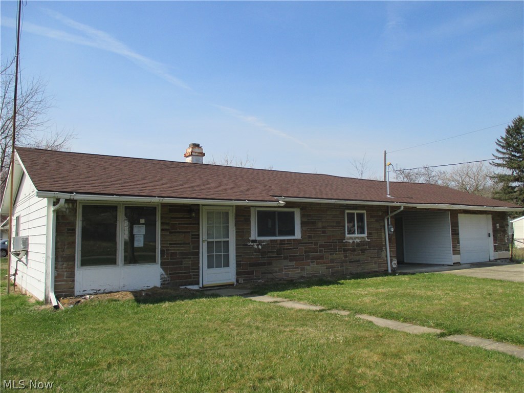 3 bedroom, 1 bath home with rear patio and breezeway...property sold as is