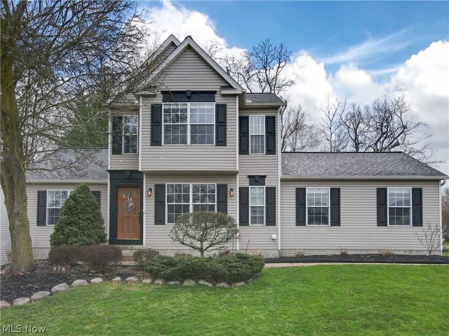 Welcome home to 978 Lakeshore Walk in Medina’s Larken Lakes subdivision.  This lovingly maintained colonial is located in the heart of Medina with the schools and shopping very close by.  Upon entering you will be greeted by a large family room with cathedral ceilings, a stunning chandelier, custom built-in shelves and window seat, and a beautiful gas fireplace.  The kitchen is spacious and welcoming with a glass tile backsplash, Corian countertops and plenty of cabinet space. The first-floor has a designated room for laundry with upper cabinets and a sunny window.  The sliding glass doors in the kitchen lead out to the large concrete stamped patio which is covered by a cedar pergola . The inviting backyard is full of beautiful trees and shrubs. The back of the home has a perfect view of the Forest Meadows lake.  The second floor has a spacious master bedroom with a walk in closet and an en-suite bathroom. The two additional bedrooms, another full bathroom, and a linen closet complete the second floor .  The expansive basement was redone in 2021 and it houses additional built-in shelves, plenty of storage space, 2 closets and a lovely remodeled half-bath.  As an added bonus, all exposed plumbing lines were upgraded to copper.  The side entry garage has pull down steps with a large, easily accessible, storage space above .   This home creates such an inviting atmosphere and is the perfect spot for entertaining family and friends.  With the perfect location, stunning lake views, abundant natural light and plethora of space, this home is truly one-of-a-kind!   Schedule your showing today or check it out at the Open House Saturday, March 23rd from 12pm-2pm.  This one won’t last!