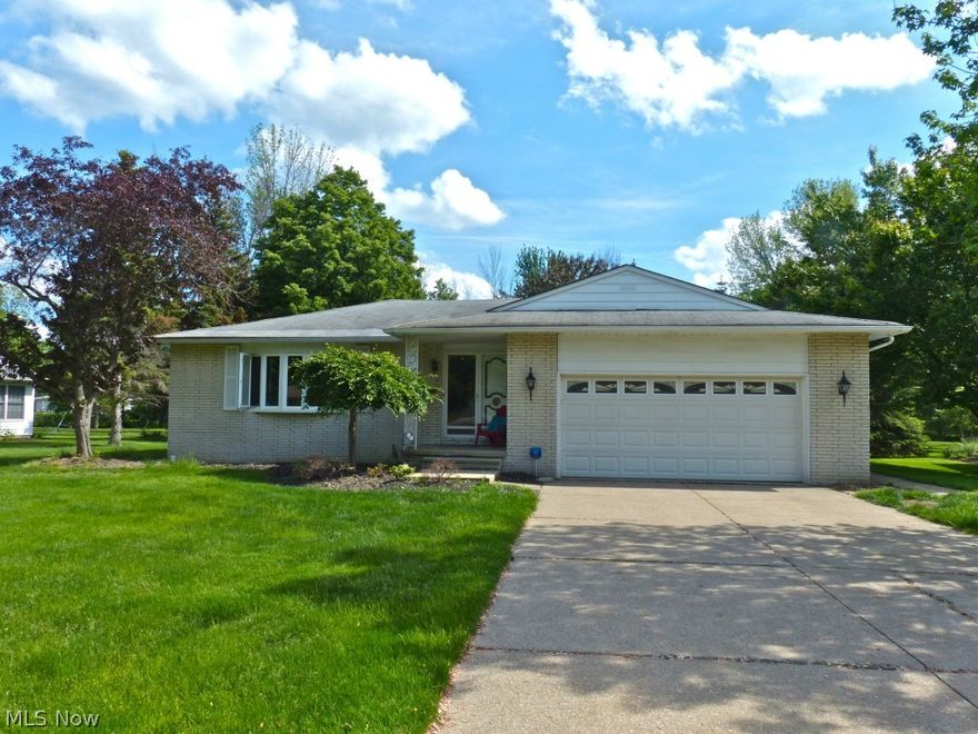 GREAT brick front ranch in desirable Ohio Street area, Covered front porch leads to an impressive open floor plan, beautiful hardwood floors grace the great room with bay window, Open style remodeled kitchen with granite, stainless (French door fridge) and breakfast bar, dining room with attractive light fixture, step down into the family room with sliding doors to covered patio, Master bedroom has an attached half bath, updated full bath in hall, full unfinished basement with storage closet plus inviting full bath with jetted tub. New tankless HW in 2014, New furnace and central air in 2013, New windows in 2014, updated electrical, storage shed, sump pump, 2 car att garage, home warranty.  Bellflower Elementary. Move right in and feel at home!